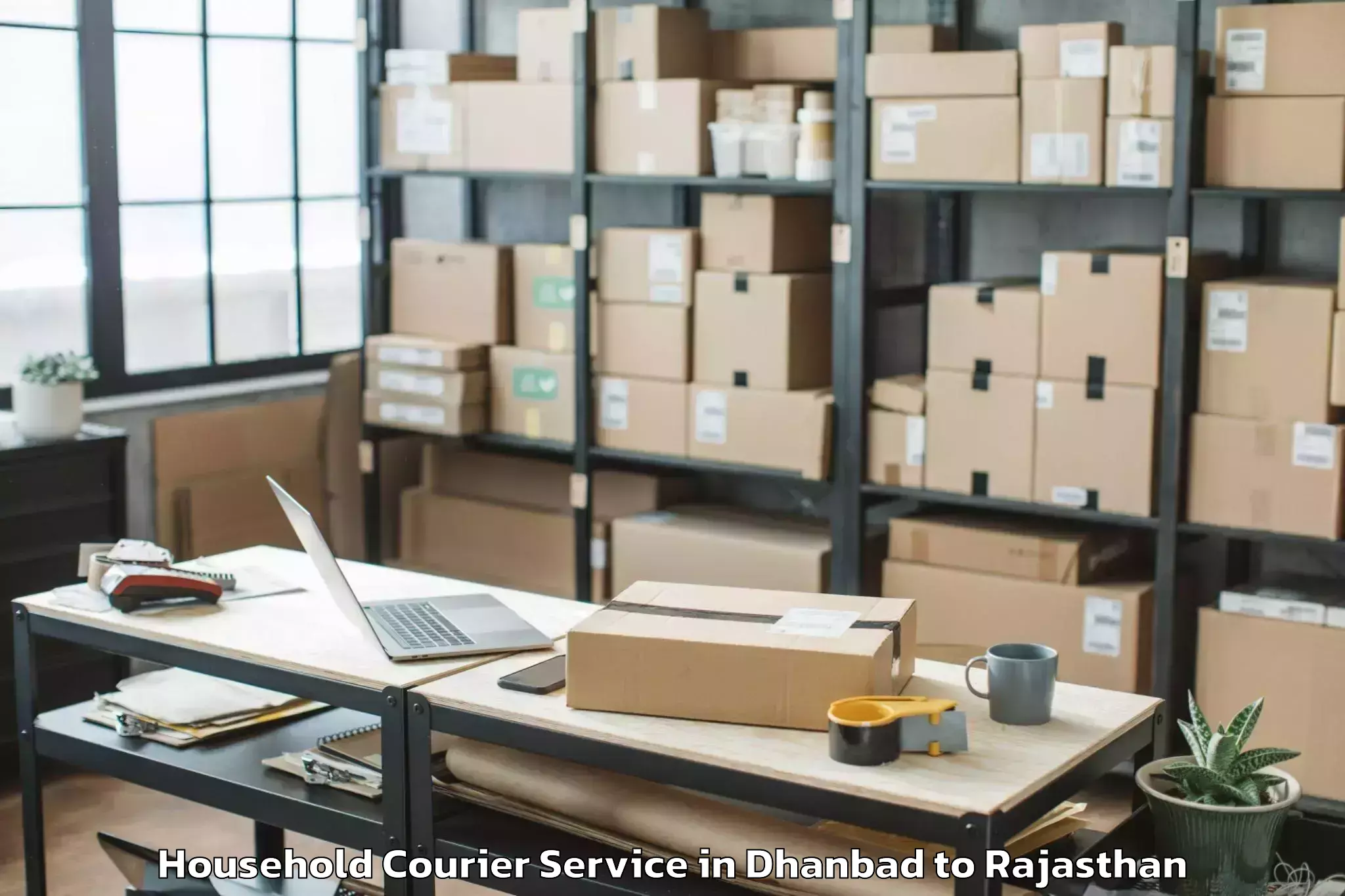 Hassle-Free Dhanbad to Jamwa Ramgarh Household Courier